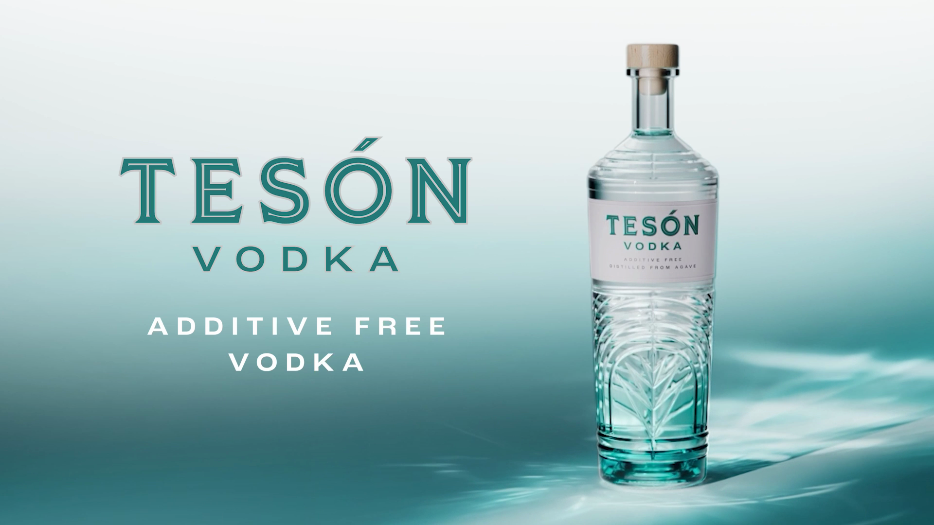 Tesón Vodka bottle centered with aqua water background